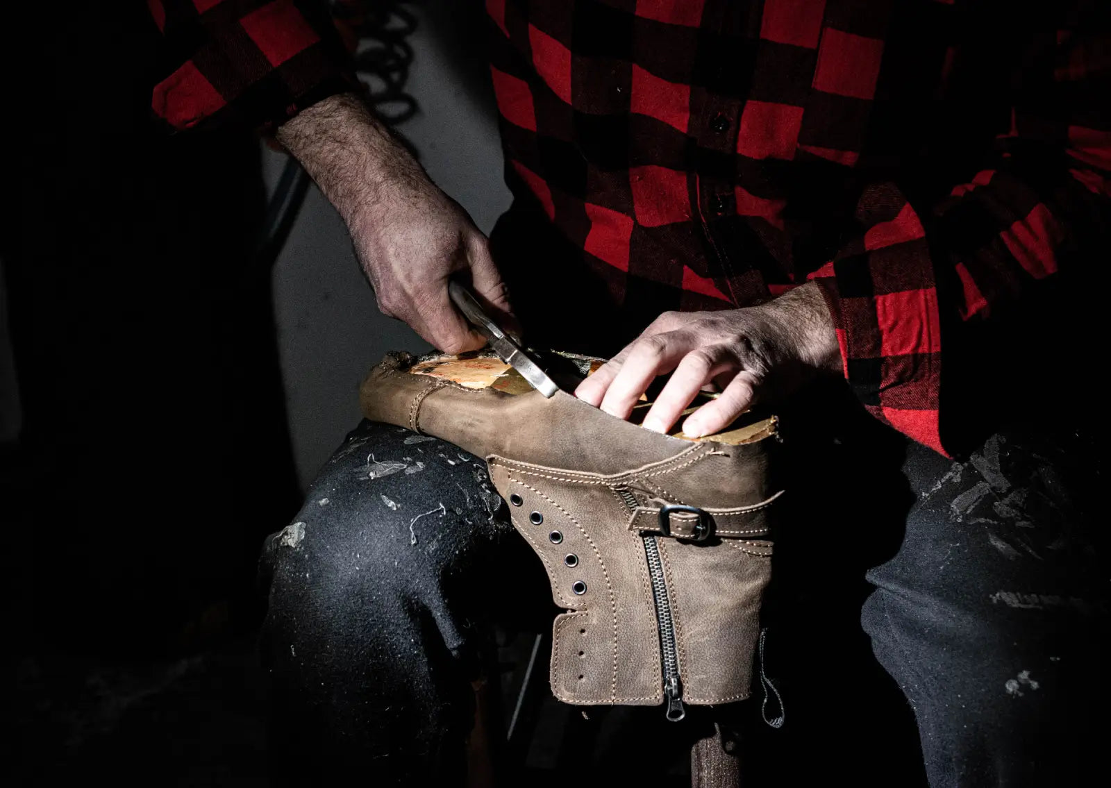 Załaduj film: Handmade shoe production process